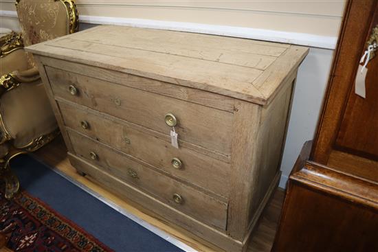 A 19th century French bleached oak commode